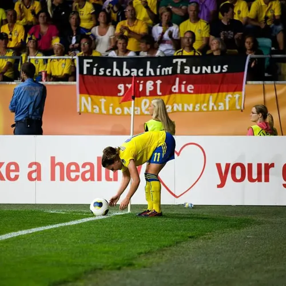 Swedish footballer preparing to take a corner